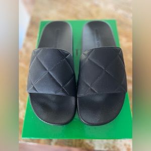 Beautiful pair of slides only worn twice , sticker still on bottom. Box incl